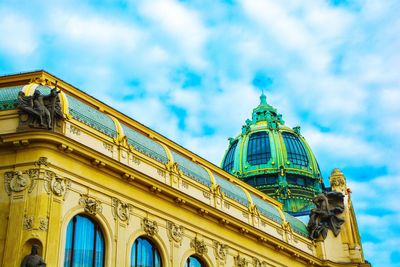 Low angle view of building against blue sky