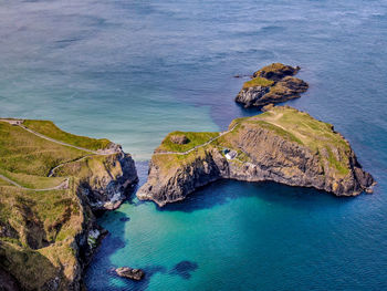 High angle view of rocks in sea