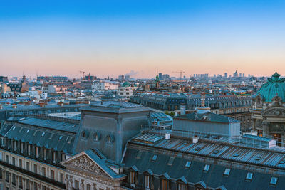 High angle view of city against sky during sunset