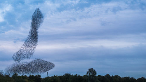 Low angle view of a sculpture against sky