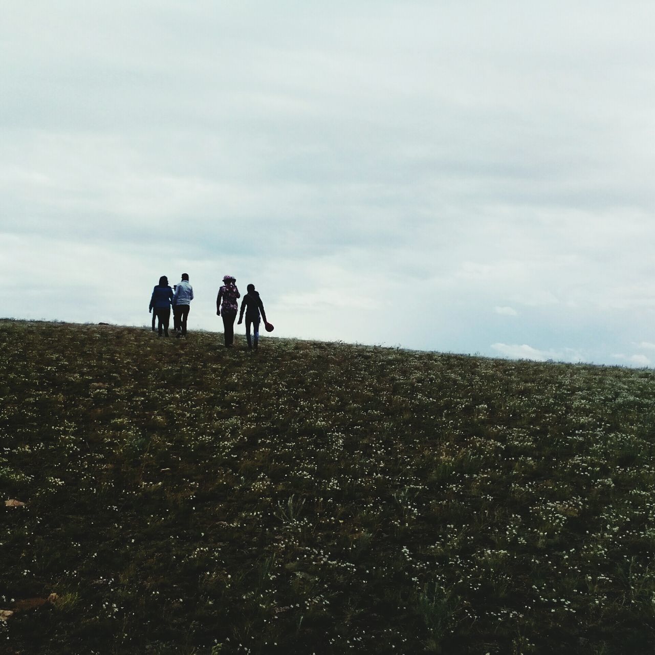 sky, nature, field, landscape, real people, scenics, beauty in nature, togetherness, day, lifestyles, leisure activity, tranquility, cloud - sky, walking, tranquil scene, men, outdoors, adventure, growth, full length, friendship, people