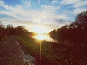 Scenic view of landscape against sky during sunset