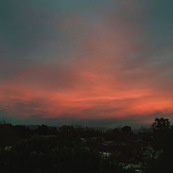 Scenic view of dramatic sky during sunset