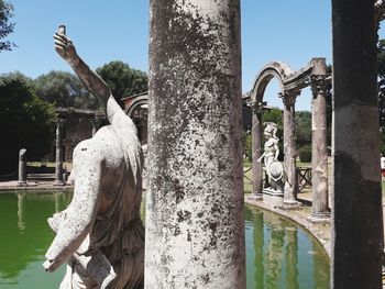 Statue of fountain in lake