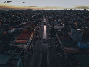 High angle view of street amidst buildings in city