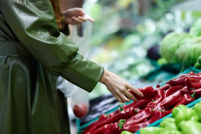 Midsection of man preparing food