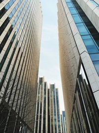 Low angle view of modern buildings against sky