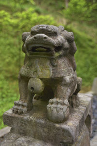 Close-up of old statue in park