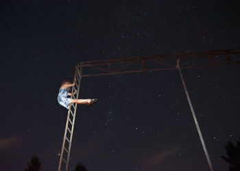 Low angle view of street light at night