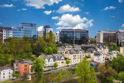 High angle view of buildings in city against sky