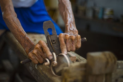 Man working on wood