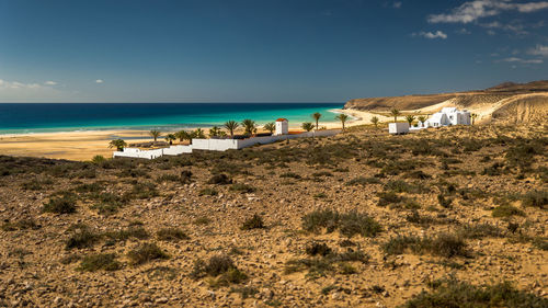 Scenic view of beach against sky