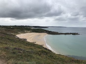 Scenic view of beach against sky