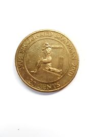 Close-up of coin against white background