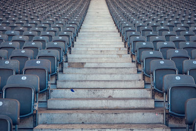 Empty chairs at stadium