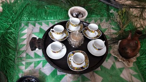 High angle view of crockery on table