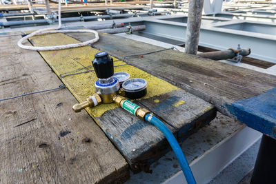 High angle view of cigarette on table by street