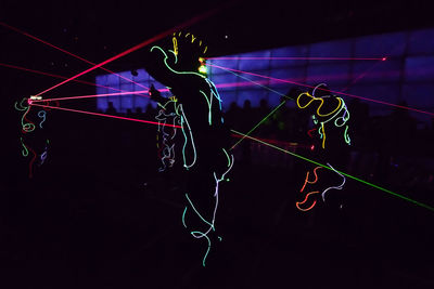 Low angle view of man at night