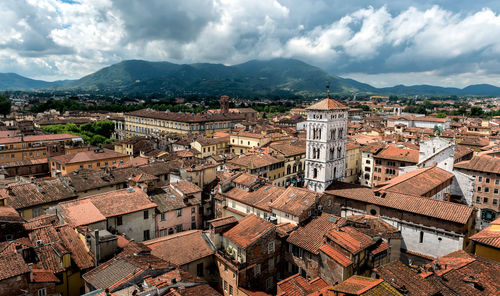 Aerial view of cityscape against sky