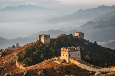 Great wall of china on mountain during sunset