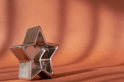 Close-up of glass container on table at home