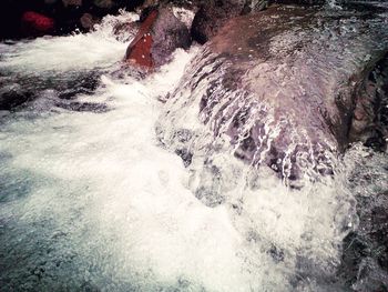 Waves splashing on rocks