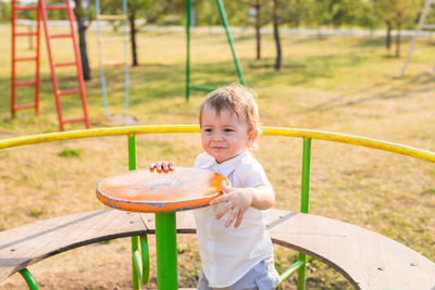 Cute boy playing in park