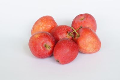 Close-up of apples on white background