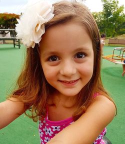 Close-up portrait of smiling girl