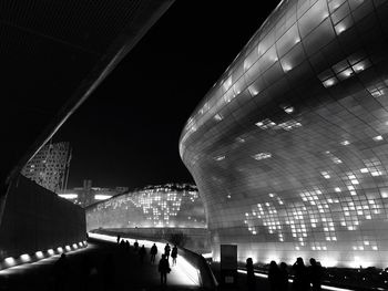 Illuminated buildings in city at night