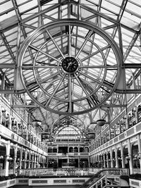 Low angle view of ferris wheel against sky