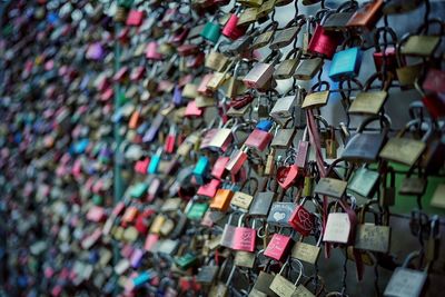 Full frame shot of padlocks on bridge railing