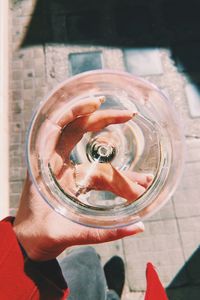 Close-up of person holding glass