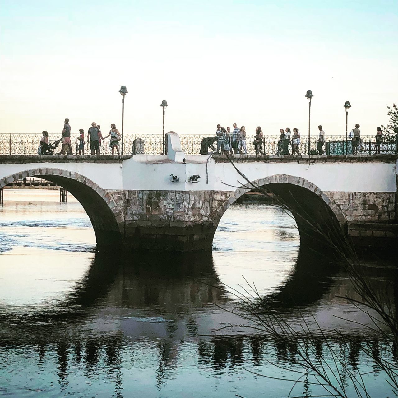 ARCH BRIDGE OVER RIVER AGAINST SKY