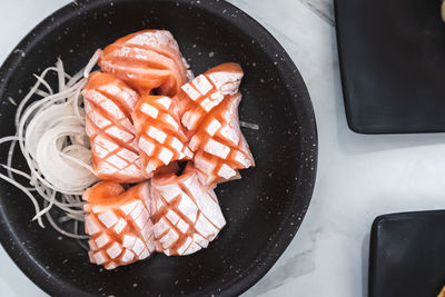 High angle view of meat in cooking pan