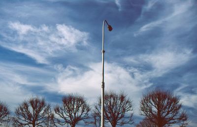 Low angle view of street light against sky