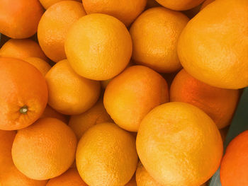 Full frame shot of oranges in market