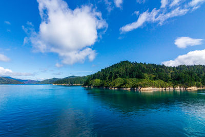 Scenic view of marlborough sounds against blue sky