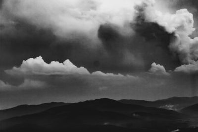 Low angle view of mountain range against sky