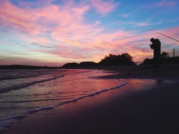 Scenic view of beach during sunset