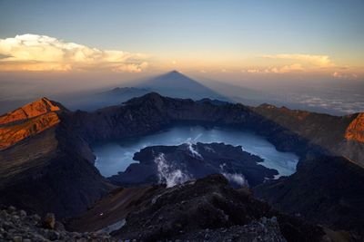 Scenic view of mountains against sky during sunset