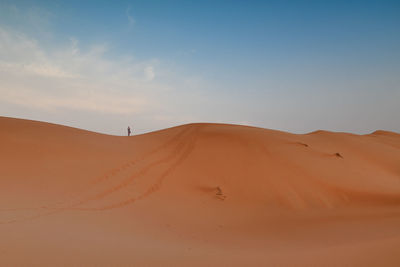 Scenic view of desert against sky