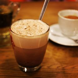 Close-up of cappuccino on table