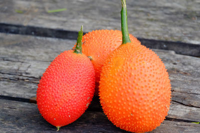 Close-up of orange fruit on table