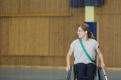 Disabled woman in gym