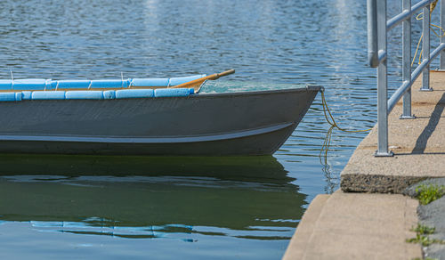 Fishing boat moored in lake