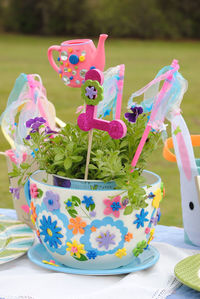 Close-up of plants and decorations on table during easter