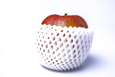 Close-up of apple against white background