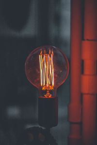 Close-up of illuminated light bulb