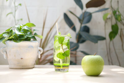 Close-up of green fruits on table